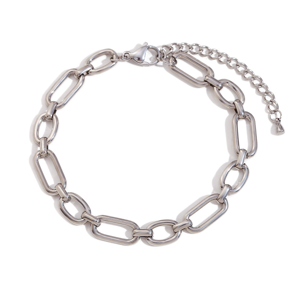 Tobillera minimalista geométrica de acero inoxidable con detalles de imperdibles chapados en oro de 14 quilates para mujer