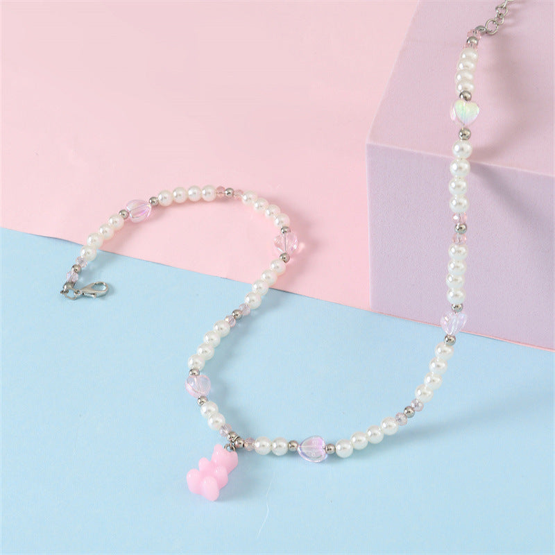 Collana con ciondolo in resina a forma di orsetto e cuore per bambine con catena di perle a lunghezza regolabile