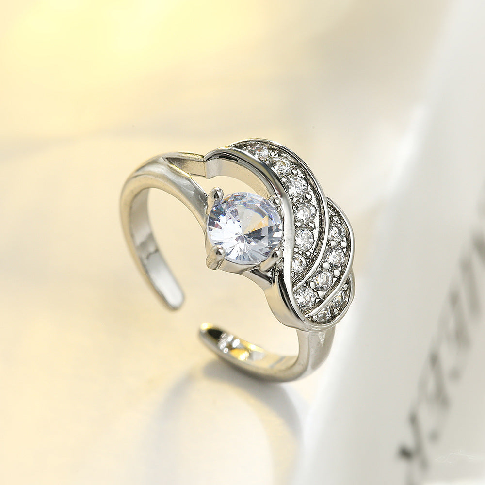 Anello da donna minimalista geometrico a forma di ala in rame con zirconia a micro-pavé