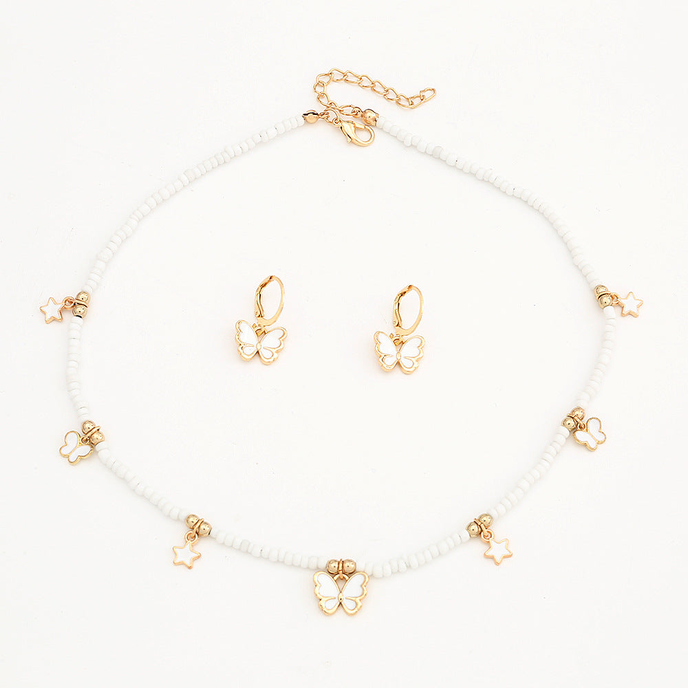 Set de collar con colgante minimalista de mariposa y estrella para niñas, joyería de aleación con cadena de perlas