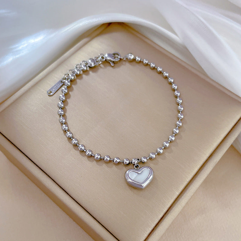 Pulsera de mano bohemia vintage de acero de titanio con corazón, cuentas redondas y ondas para mujer