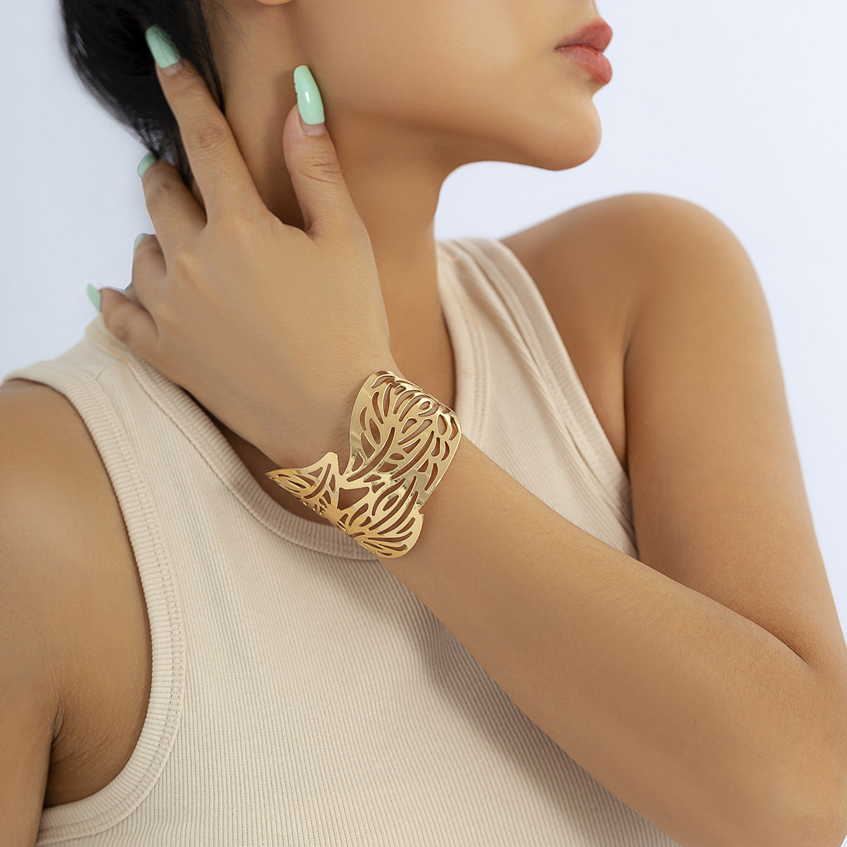 Minimalist Geometric Metal Bracelet with Hollow Floral and Leaf Motifs Electroplated for Women