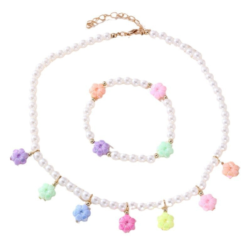Dulce juego de collar y pulsera de cristal con nudo floral para niñas con colgante de aleación en colores pastel de helado