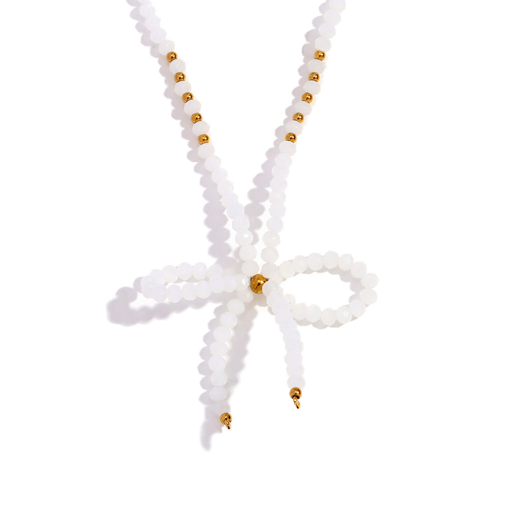 Collana con ciondolo minimalista a forma di fiocco in acciaio inossidabile con strass da donna