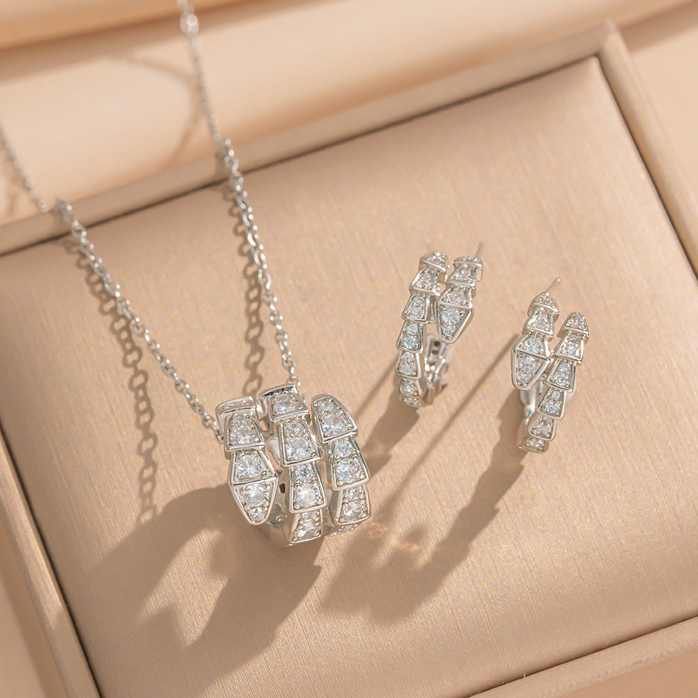 Orecchini di lusso minimalisti in rame a forma di serpente con intarsi in zircone, set di gioielli di moda regolabili per donne e uomini