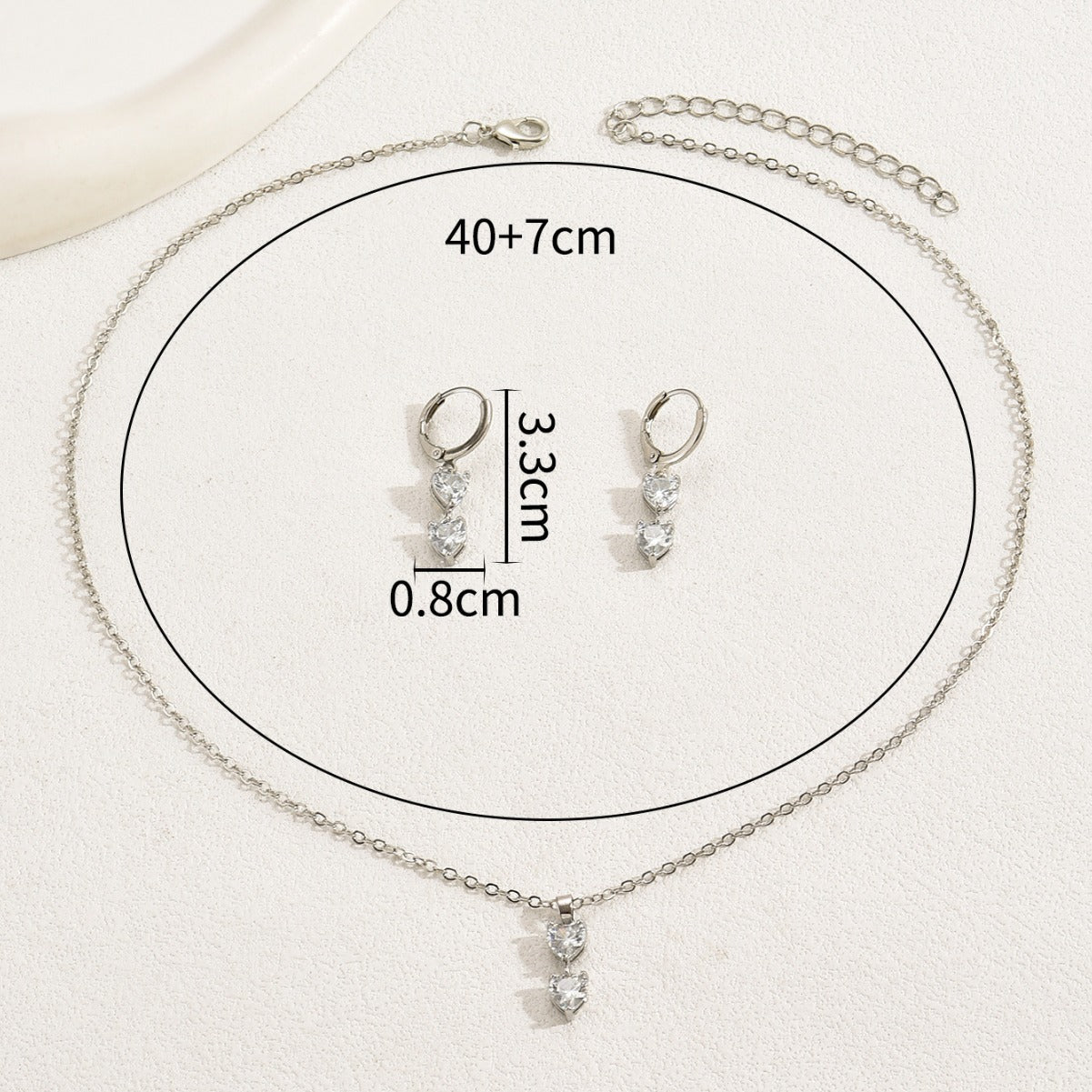 Set di collana e orecchini a cuore minimalista in lega con intarsio di zirconi da donna