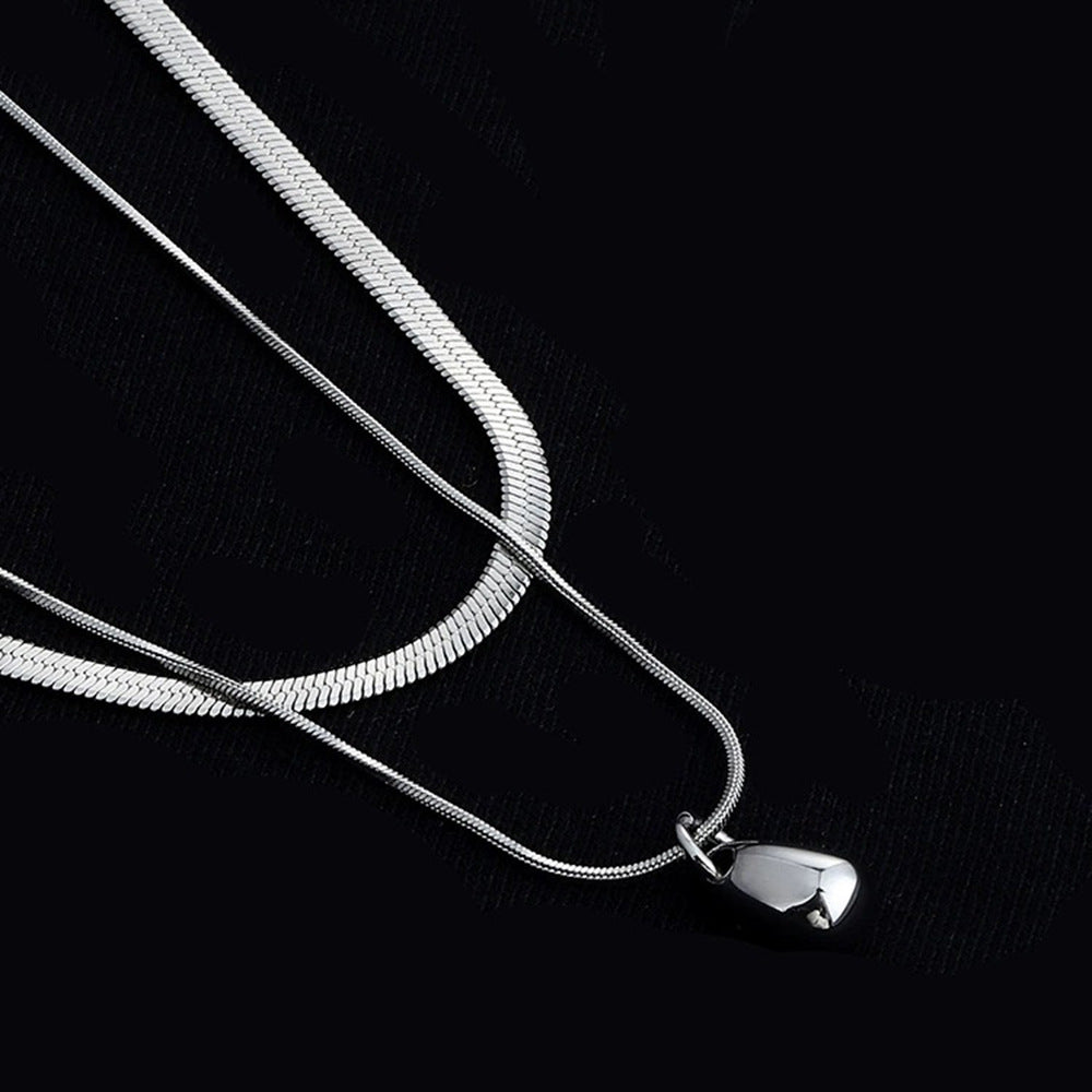 Collar minimalista de doble capa con colgante de lágrima en acero inoxidable con acabado pulido y cadena de serpiente, unisex