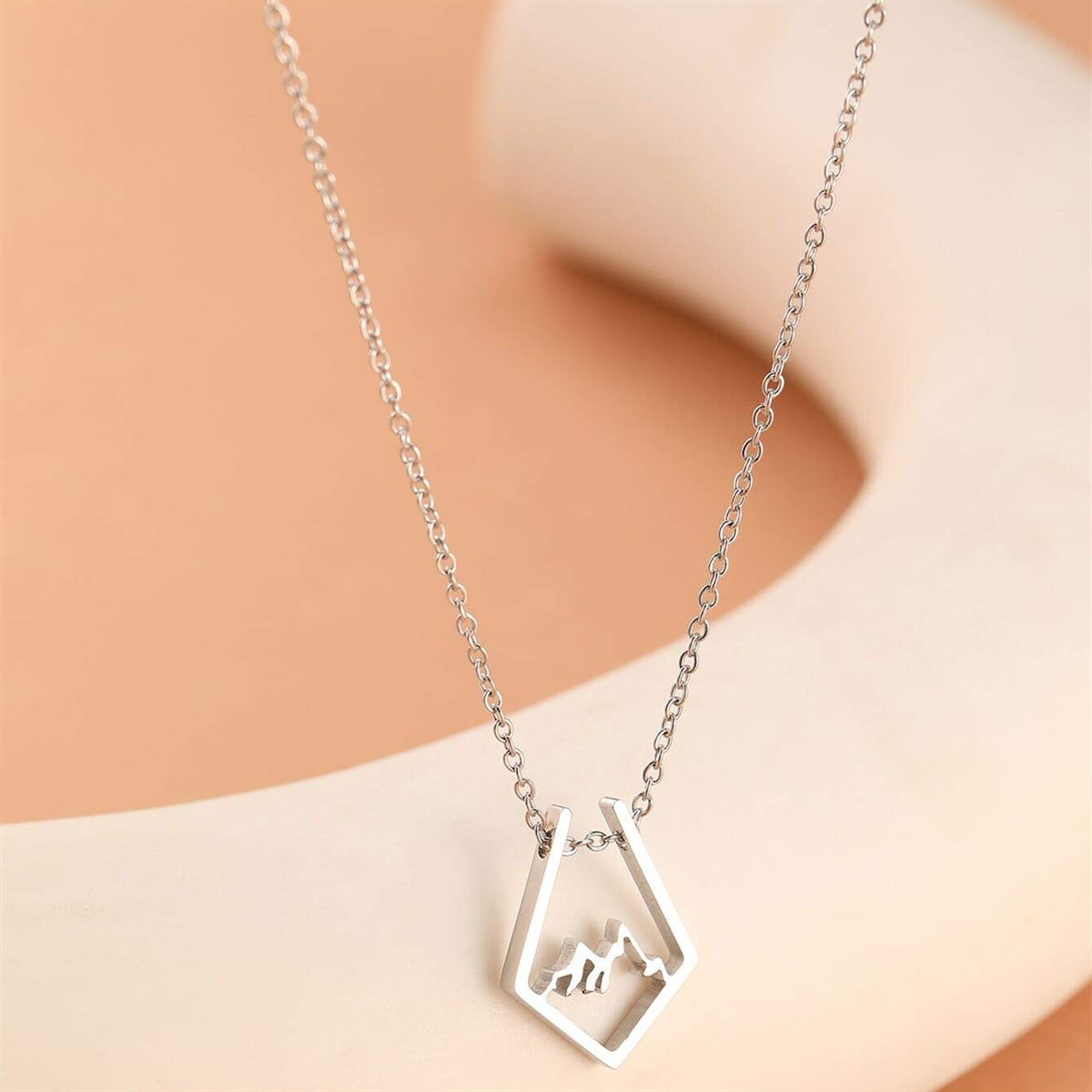 Natural Style Geometric Hollow Mountain Silhouette Pendant Necklace in Titanium Steel with Plated Finish on Pearl Chain for Everyday Wear and Holiday Gifting