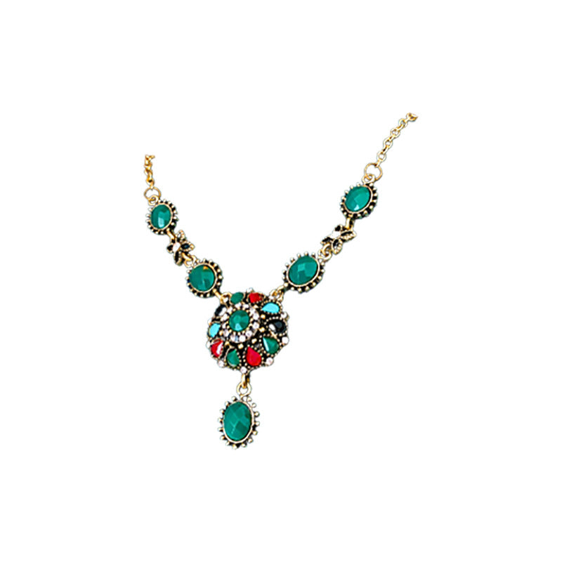 Collana con pendente rotondo floreale vintage in lega con intarsio di strass e placcatura in oro da donna