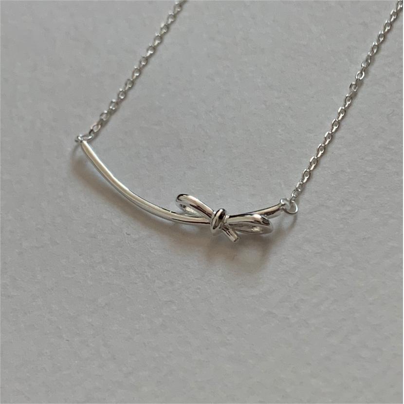 Minimalist Bow Knot Pendant Necklace in 925 Sterling Silver with Plated Finish on Cross Chain for Women
