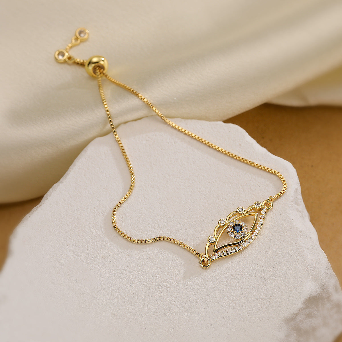 Bracciale da donna minimalista geometrico placcato in rame oro zircone con occhio di Allah