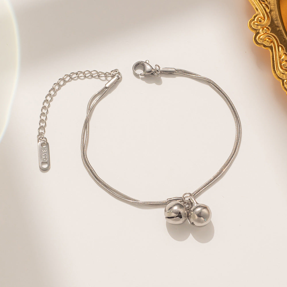 Minimalist Cute Double-Layer Snake Chain Bracelet for Women in Titanium Steel with Gold Plating and Geometric Bell Charms