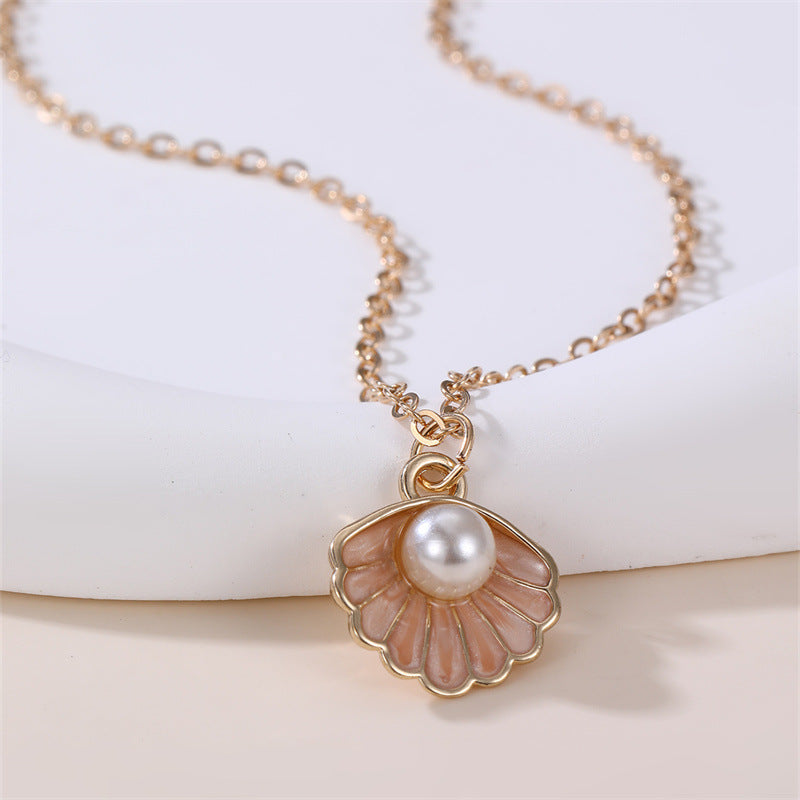 Dulce Collar con Colgante de Mariposa y Lazo Fresco para Niñas con Dije de Concha con Perlas de Aleación y Acabado Esmaltado Artesanal