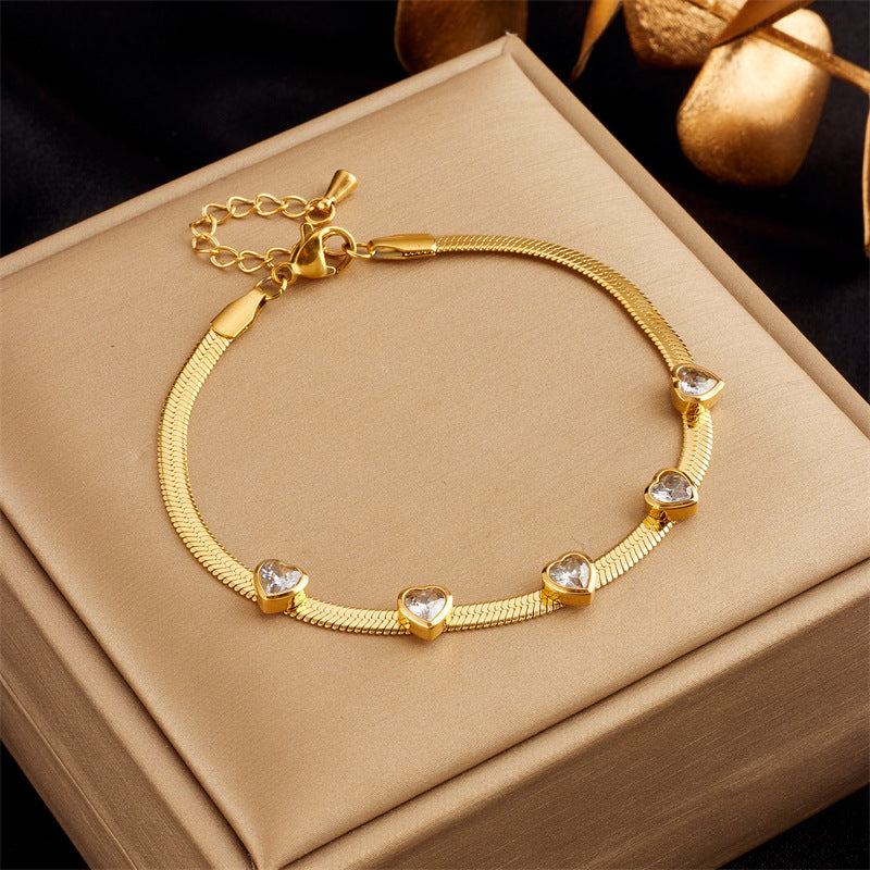 Bracciale Minimalista a Catena Serpentina in Acciaio al Titanio a Forma di Cuore con Intarsio di Strass da Donna