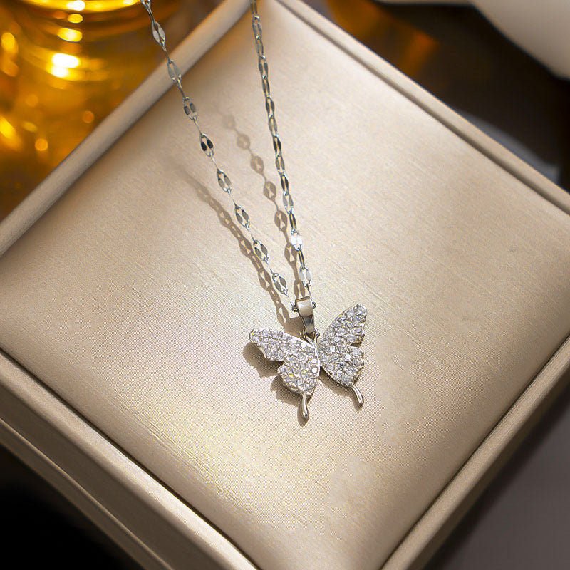 Minimalist Bow Knot Pendant Necklace for Women in Titanium Steel with Gold Plating on Wavy Chain