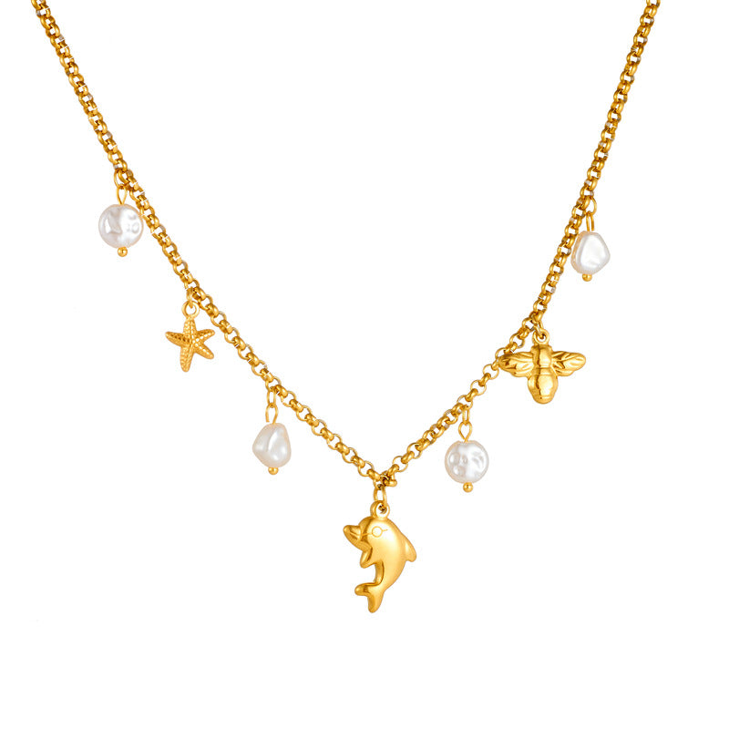 Collar con colgante de delfín, estrella de mar y perla, inspirado en el océano, de acero inoxidable, a la moda, para mujer, con cadena lateral
