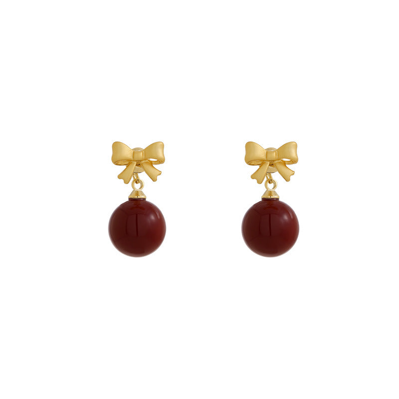 Orecchini a perno eleganti e minimalisti in resina a forma di fiocco da donna con perni in acciaio placcato, accessorio di moda di lusso