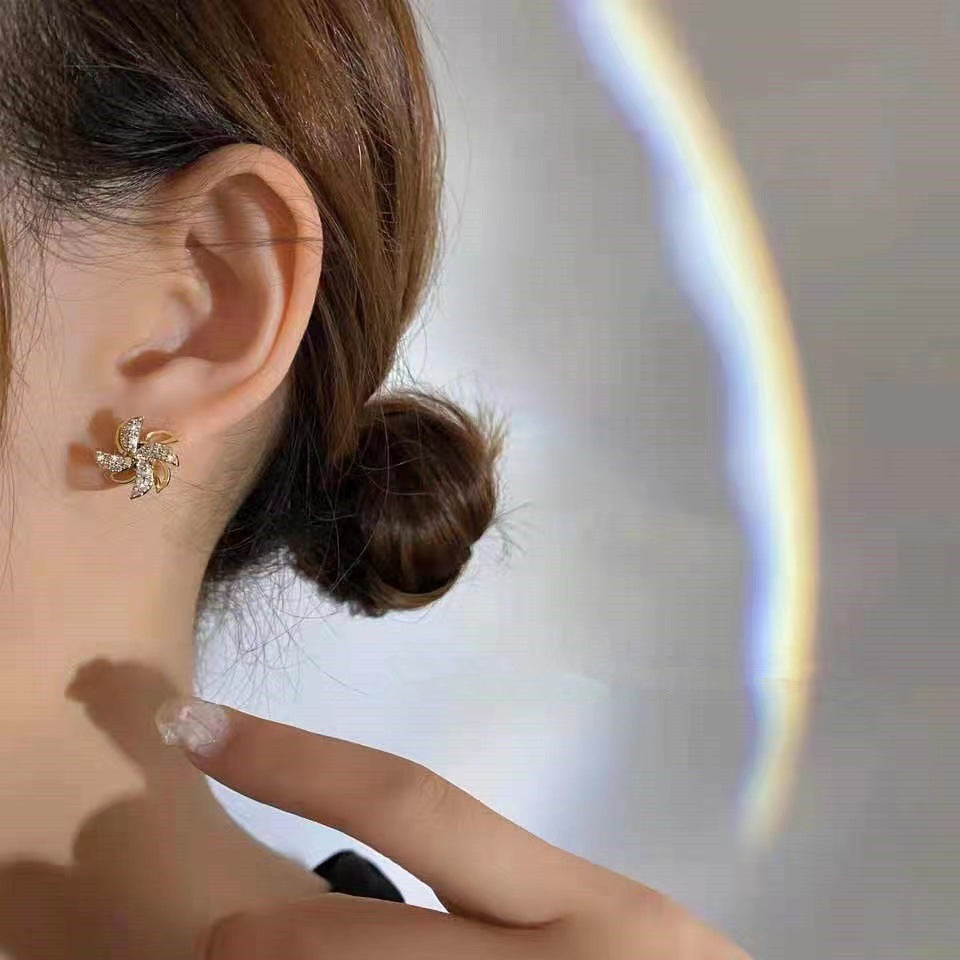 Rotatable Windmill Stud Earrings in Plated Copper with Geometric Octagonal Design for Women