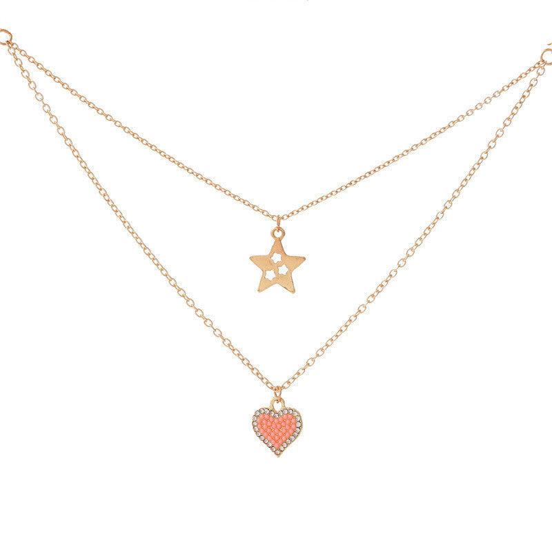 Elegante collana a forma di cuore e stella in lega per bambini con finitura smaltata e design a catena incrociata multistrato