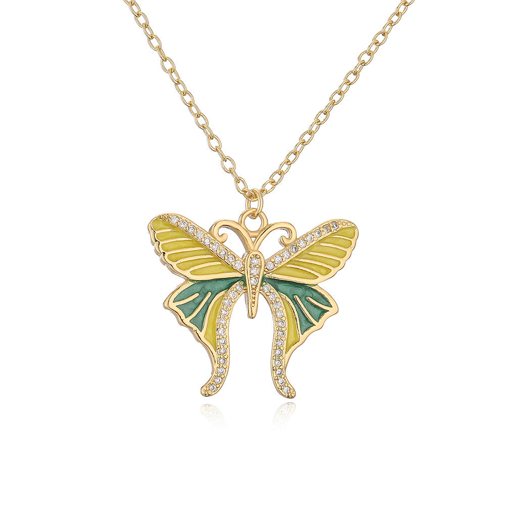 Minimalist Butterfly Pendant Necklace for Women Made of Brass with 18K Gold Plating and Enamel Finish Featuring Cubic Zirconia Inlay