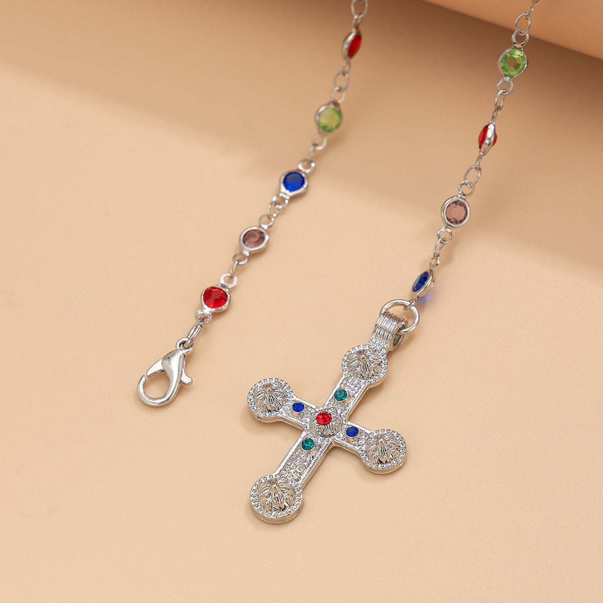 Elegante collana a sfera con pendente a perla intarsiato con strass a croce geometrica da donna