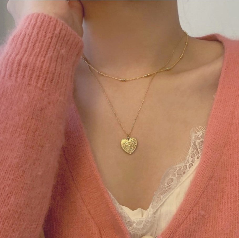 Dolce collana in argento sterling 925 placcato oro con cuore geometrico