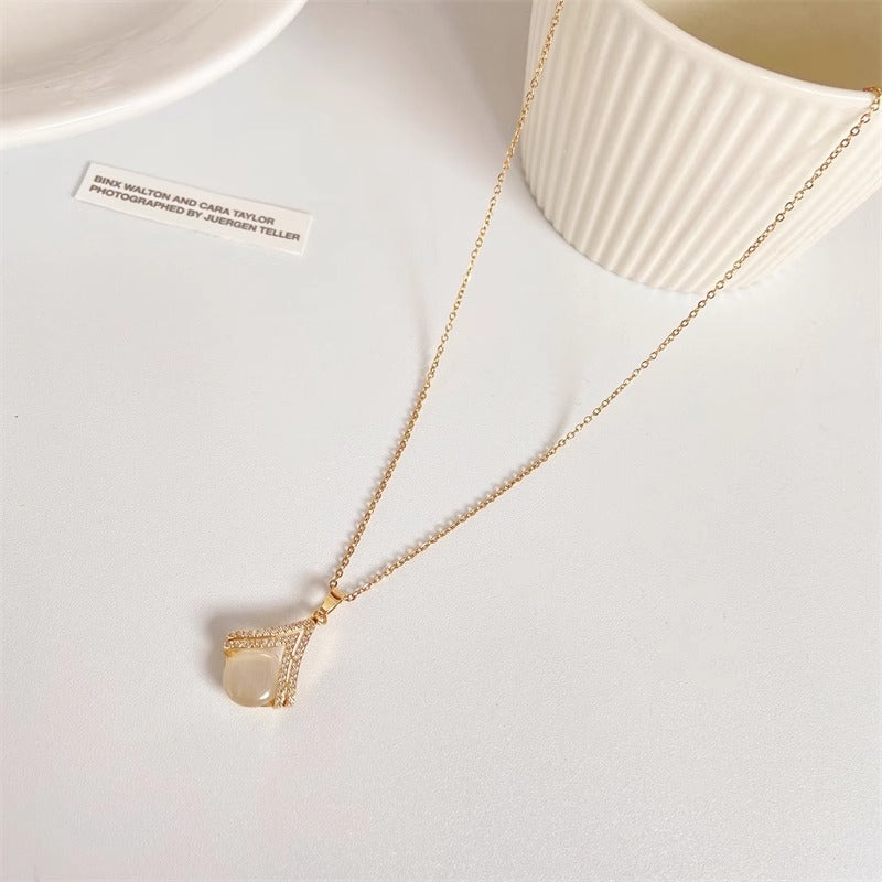 Collana con Ciondolo Occhio di Gatto Floreale dal Design Originale in Acciaio al Titanio con Finitura Placcata su Catena a O per Donna e Unisex