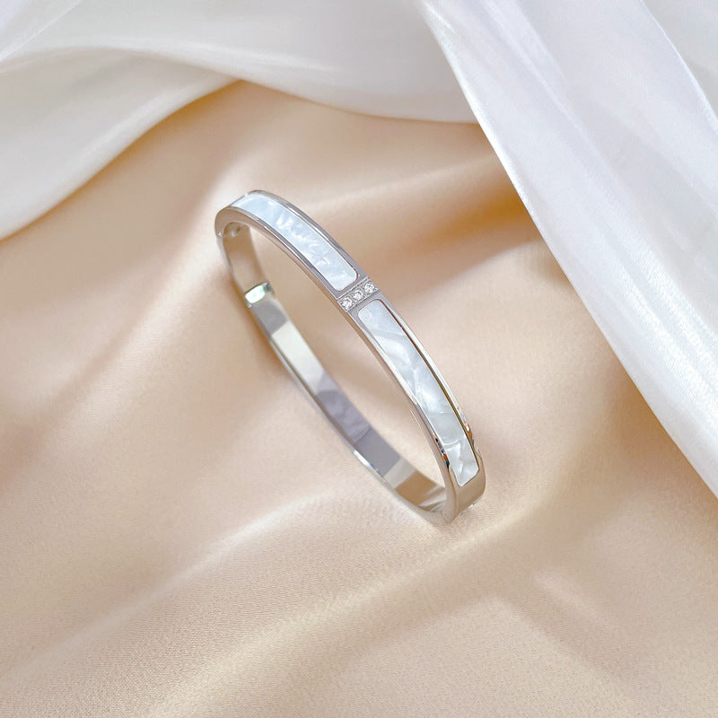 Bracciale Minimalista Etnico Vintage con Conchiglie in Acciaio al Titanio