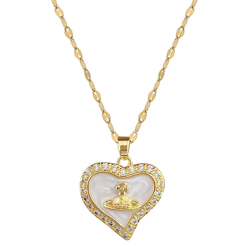 Collana con pendente a cuore e pianeta minimalista da donna e uomo con intarsio di zirconi su catena a serpente in acciaio al titanio