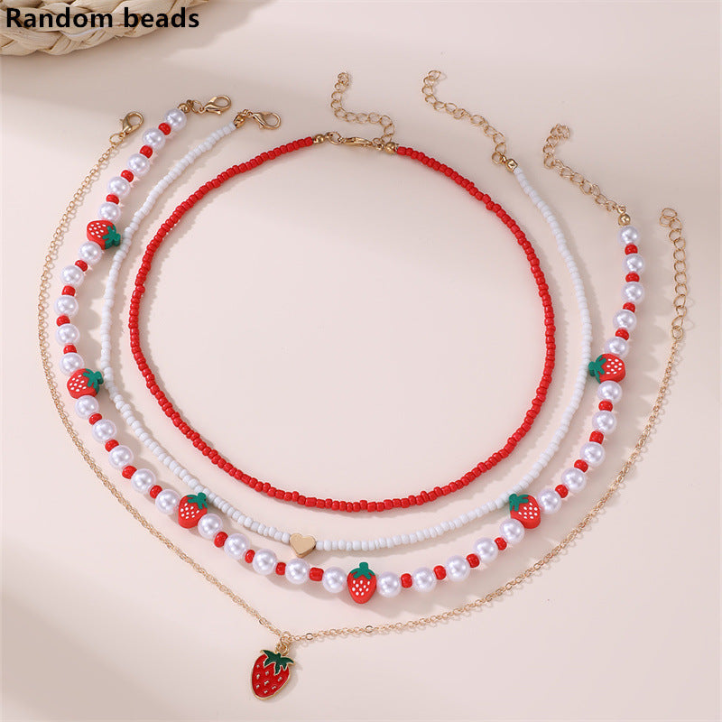 Collar con colgante de lazo y mariposa minimalista para niños, fabricado en resina con acabado esmaltado en tono rosa