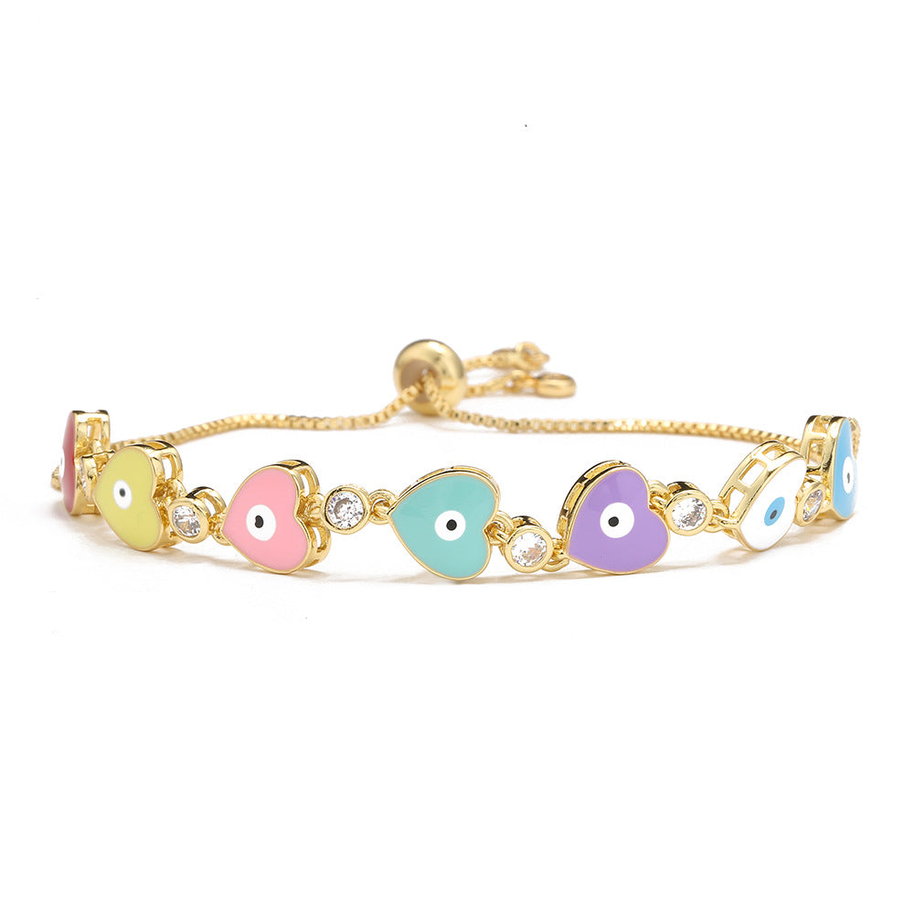 Bracciale in Rame Geometrico Stile INS Carino con Placcatura in Oro 18K, Zirconi Micro-Incastonati, Ciondolo Occhio a Cuore in Smalto per Donna