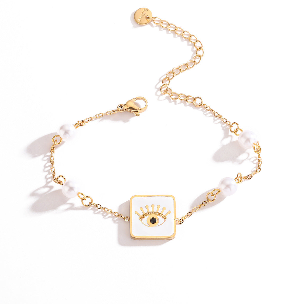 Bracciale Minimalista Geometrico in Acciaio al Titanio con Placcatura Oro, Intarsio in Zircone e Ciondolo Occhio di Allah
