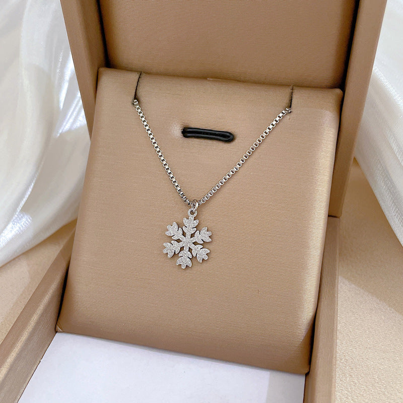 Collana girocollo minimalista in acciaio titanio geometrico con motivi floreali