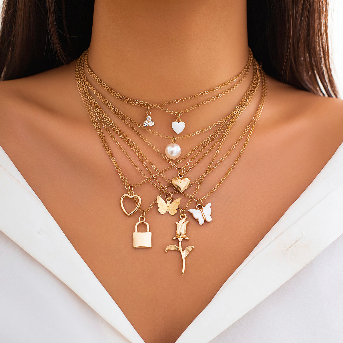 Boho Butterfly Pendant Necklace Set with Heart Star Geometric Charms Alloy Chain Tassel Detail