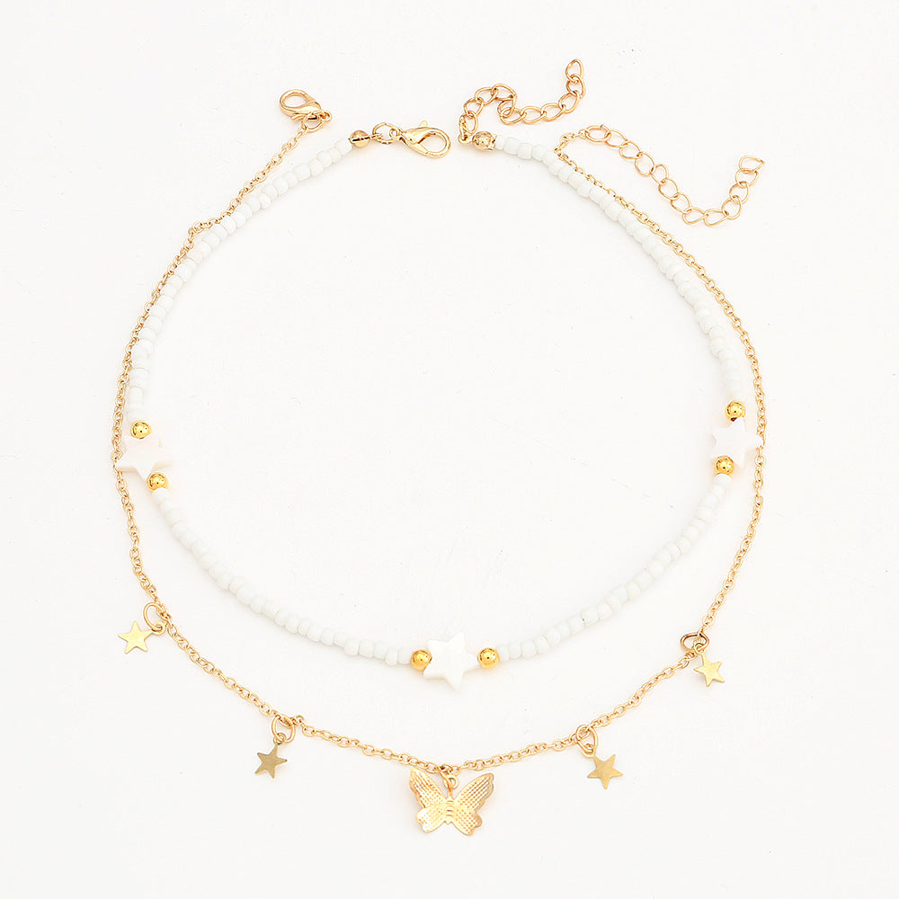 Set di collane in lega a forma di stella minimalista per bambine con catena di perline rotonde e finitura artigianale