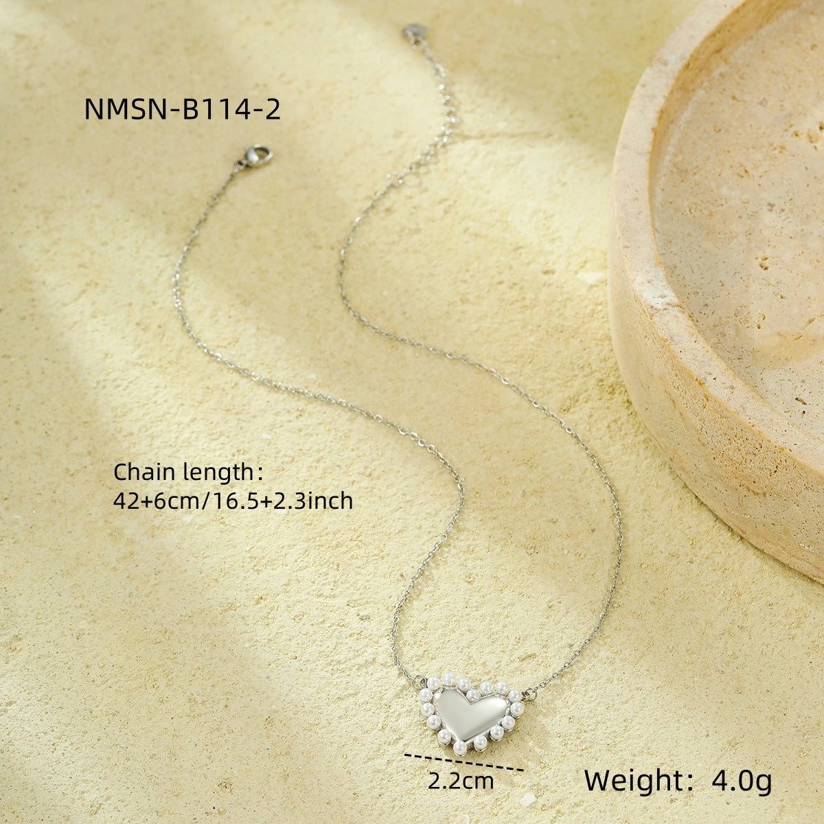 Collana con ciondolo a perla a cuore in acciaio inossidabile vintage con catena geometrica e orecchini abbinati da donna