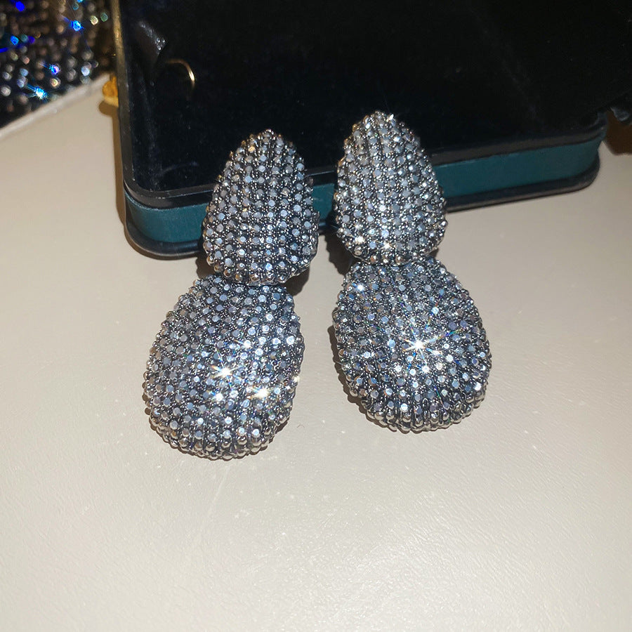 Orecchini a perno ovali geometrici vintage in lega con intarsio di strass da donna