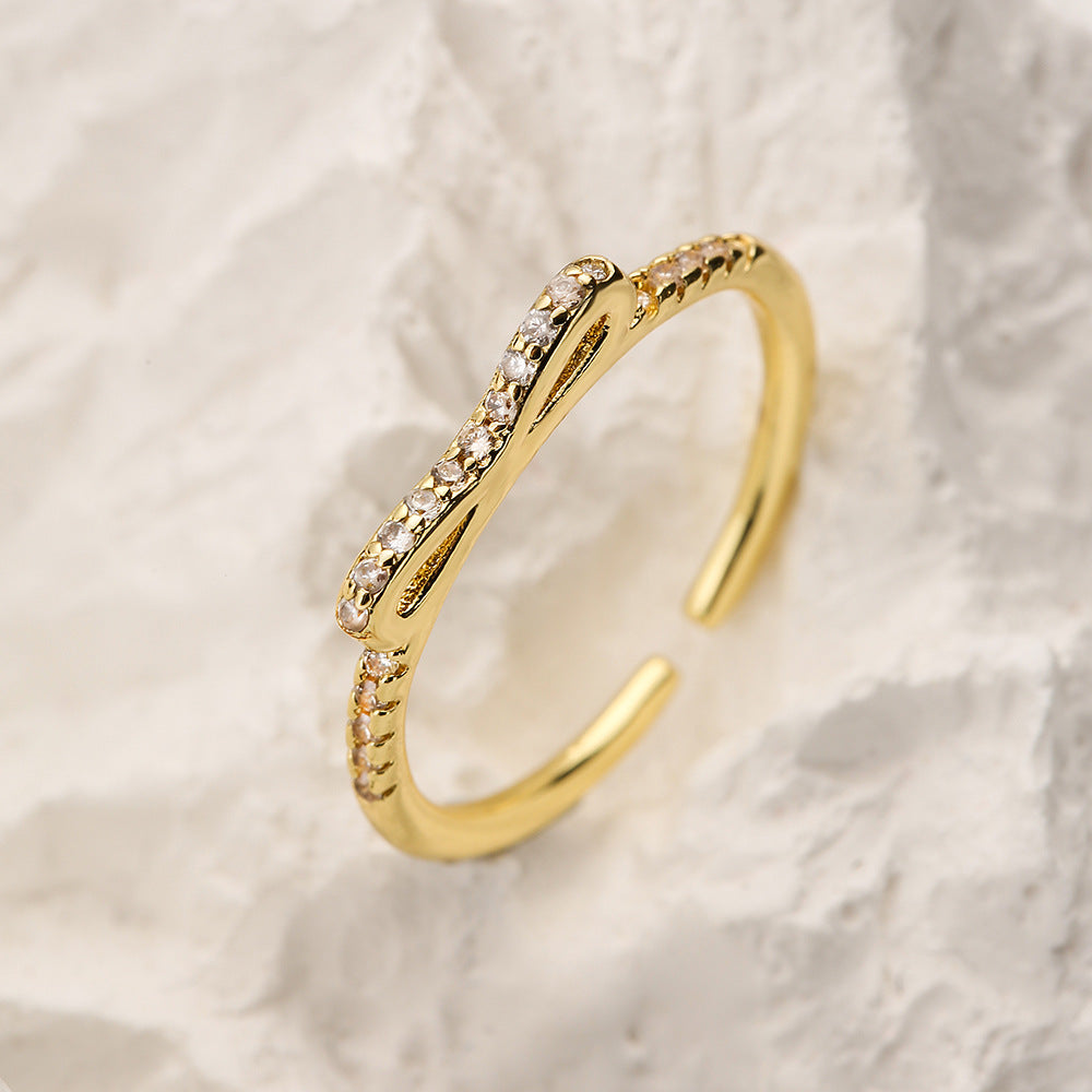 Minimalist Geometric Bowknot Opening Ring for Women in Copper with Gold Plating and Cubic Zirconia Inlay