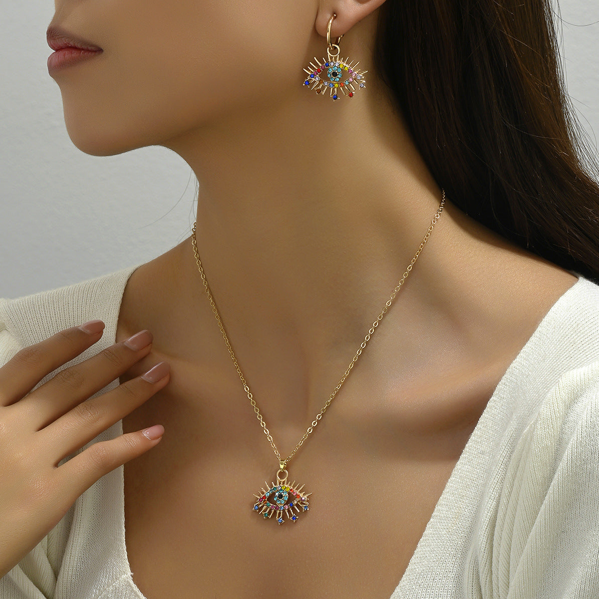 Conjunto de collar con colgante minimalista de ojo de ángel con incrustaciones de pedrería en aleación para mujer, cadena larga de clavícula y pendientes a juego