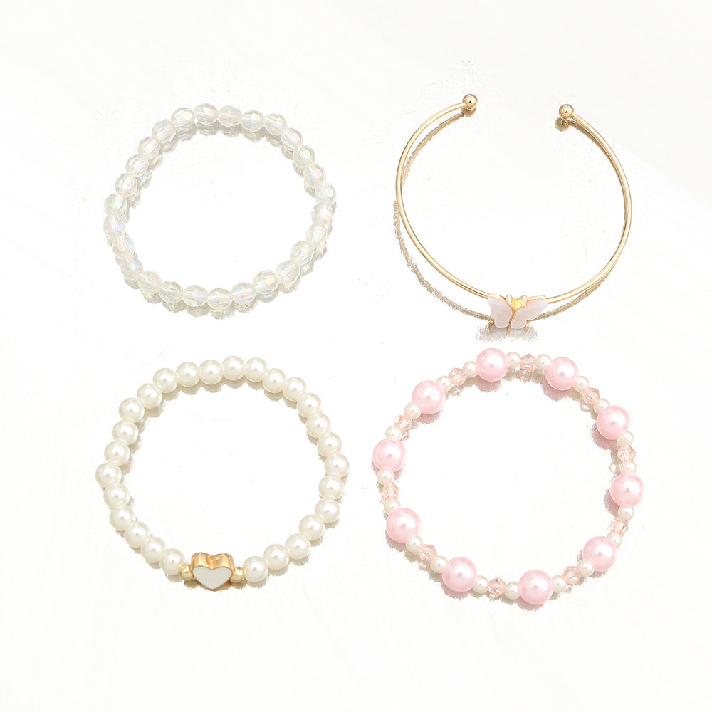Juego de pulseras de aleación con forma de corazón y mariposa para niñas con detalles de perlas, pulsera de moda minimalista para niñas