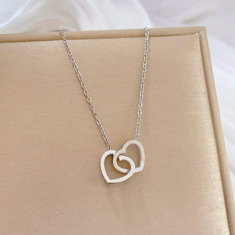 Collar con colgante de corazón geométrico minimalista de acero de titanio, elegante para la oficina