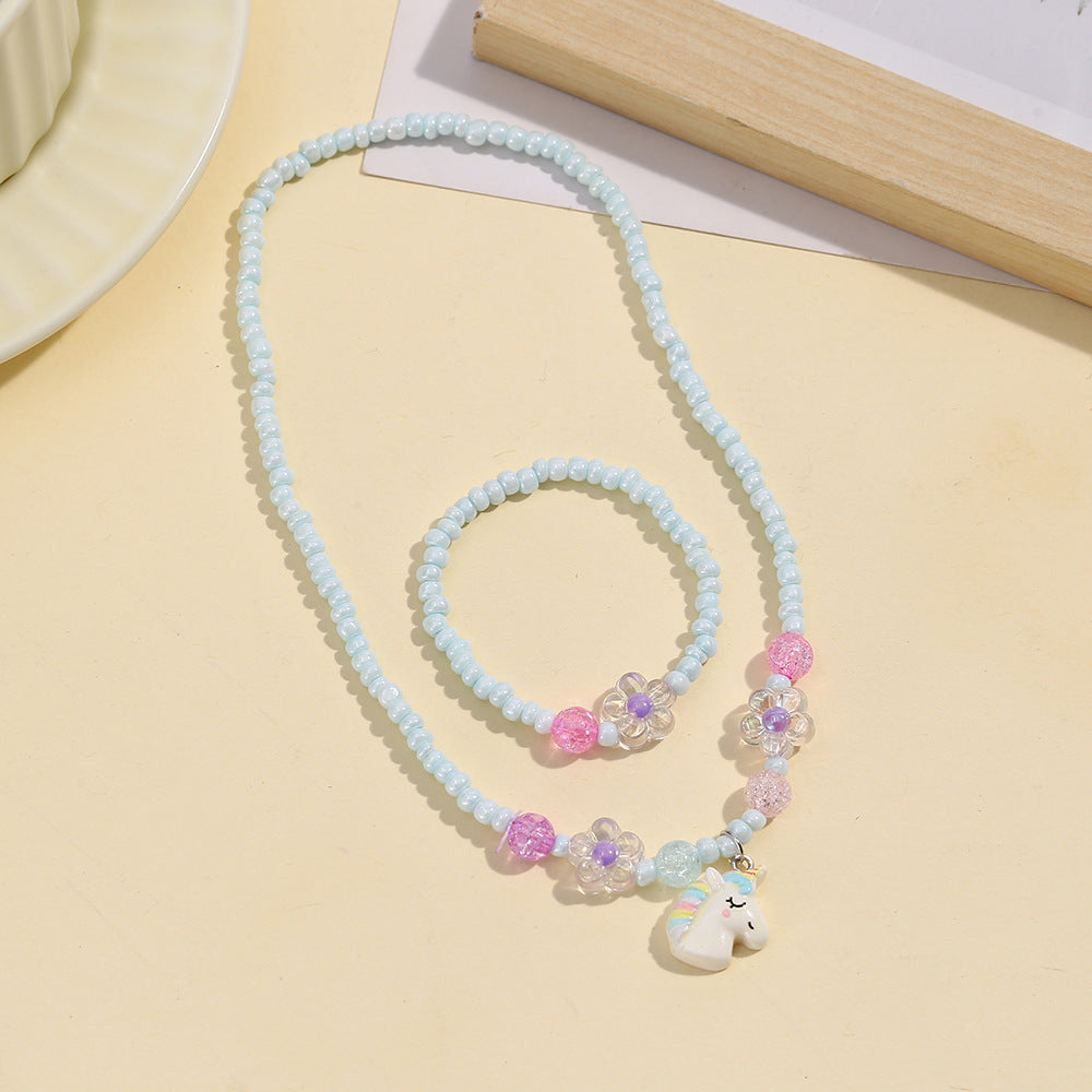 Lindo conjunto de collar de resina de sirena y unicornio para niños con detalles de arcoíris y cadena de cuentas redondas