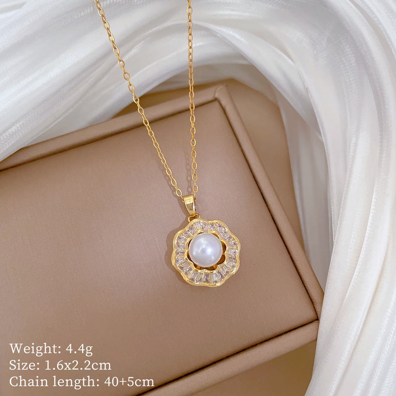 Conjunto de collar y pendientes geométricos de acero de titanio de lujo con detalles de perlas e incrustaciones de pedrería para eventos formales de mujer