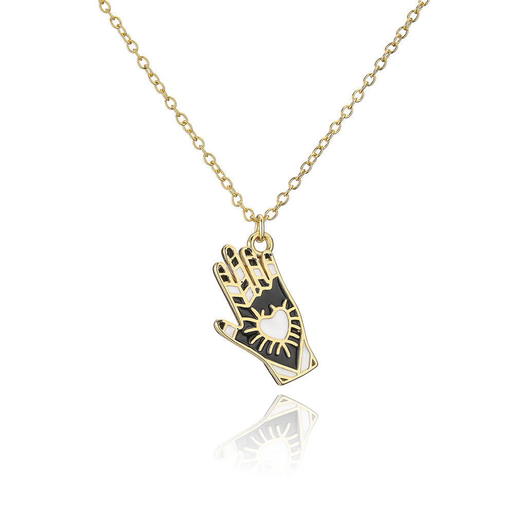 Minimalist Hand-Shaped Pendant Necklace in Copper with 18K Gold Plating and Enamel Detail