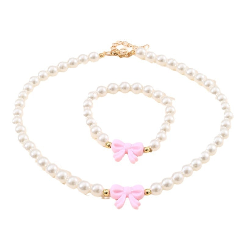 Set collana in lega a forma di fiocco stile principessa per ragazze con catena di perline rotonde e finitura artigianale