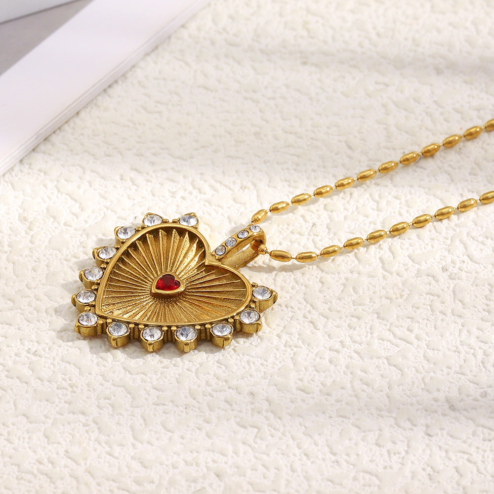 Collar con colgante minimalista de acero inoxidable en forma de corazón para mujer con baño de oro de 18K y elegante grabado