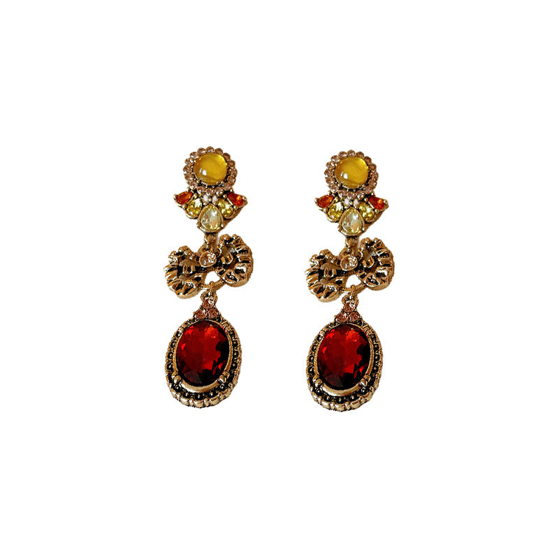 Pendientes vintage de aleación con forma de lazo e incrustaciones de diamantes de imitación con diseño geométrico ovalado para mujer