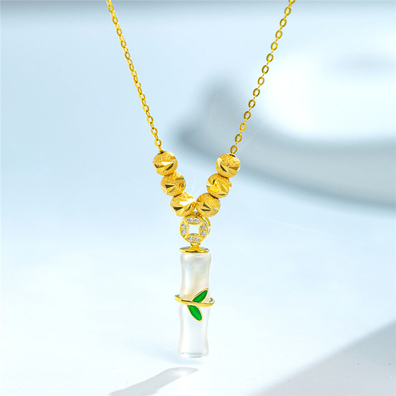 Collar minimalista de acero de titanio con forma de nudo de bambú para mujer con baño de oro y colgante floral irregular