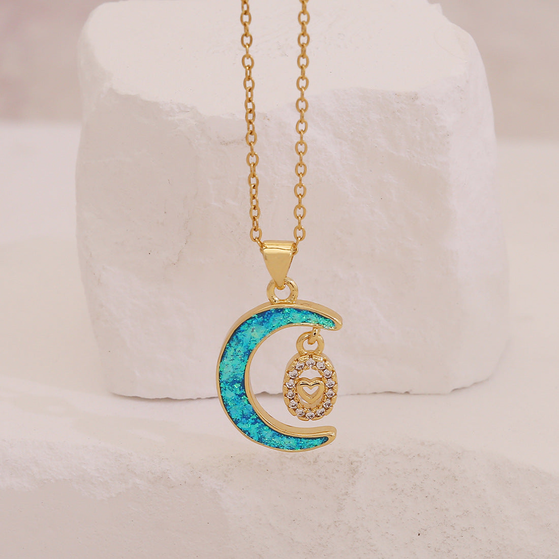 Collana pendente minimalista a stella e luna con rame placcato oro rosa, occhio d'angelo e design a rosa floreale