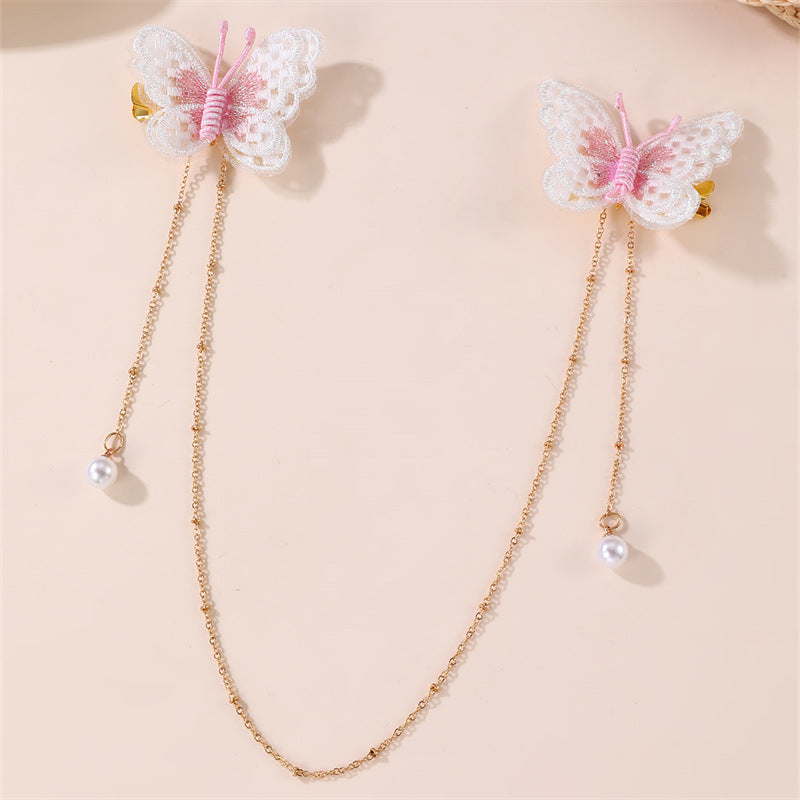 Fermaglio per capelli con fiocco a farfalla in stile naturale per bambini, con materiale in resina e dettaglio catena con nappina